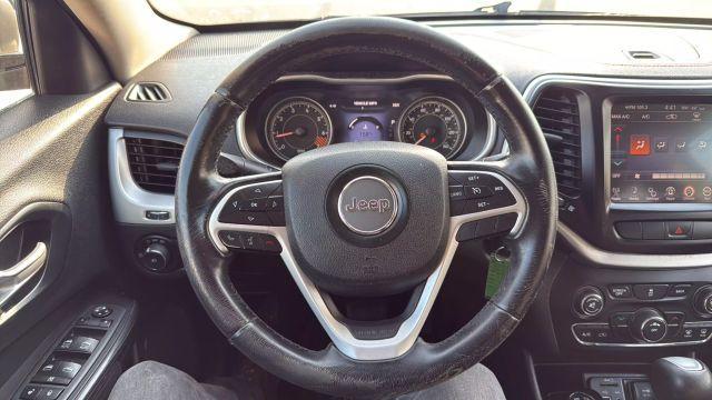 Photo of 2014 Gray Jeep Cherokee
