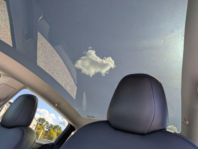 Photo of 2021 Pearl White Multi-Coat Tesla Model Y