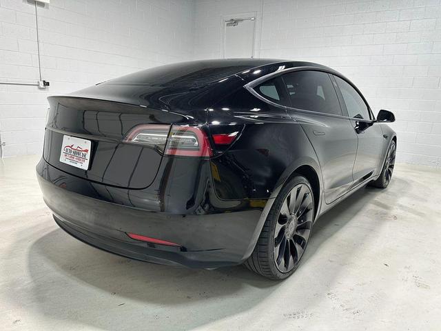 Photo of 2022 Solid Black Tesla Model 3