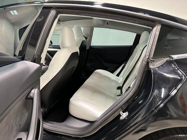 Photo of 2022 Solid Black Tesla Model 3