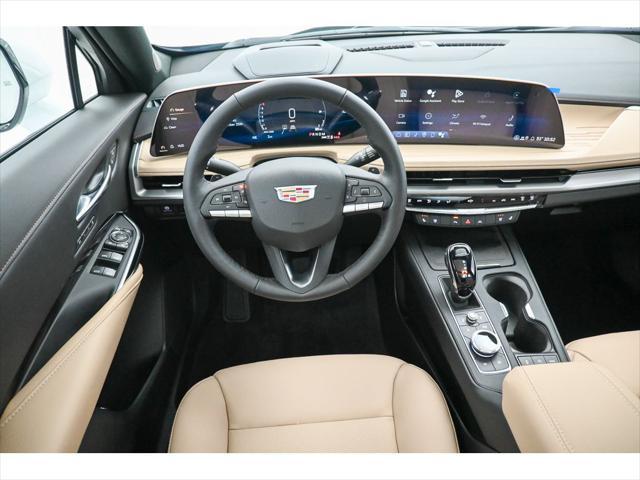 Photo of 2025 Crystal White Tricoat Cadillac XT4