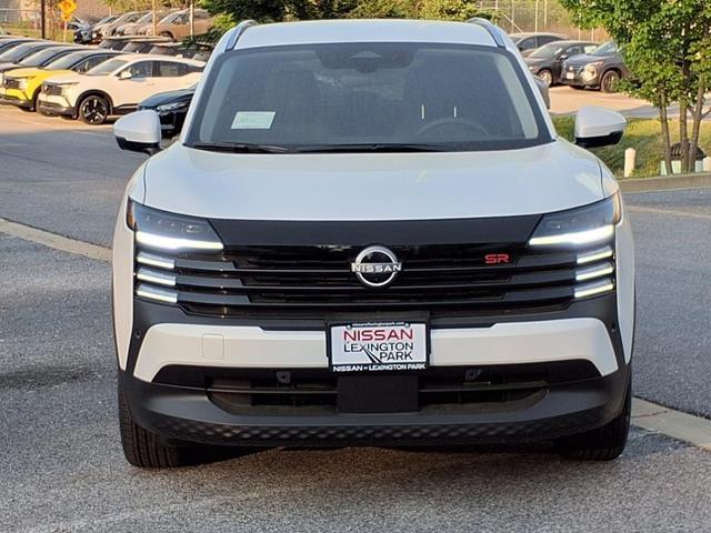 Photo of 2025 Aspen White Tricoat Nissan Kicks