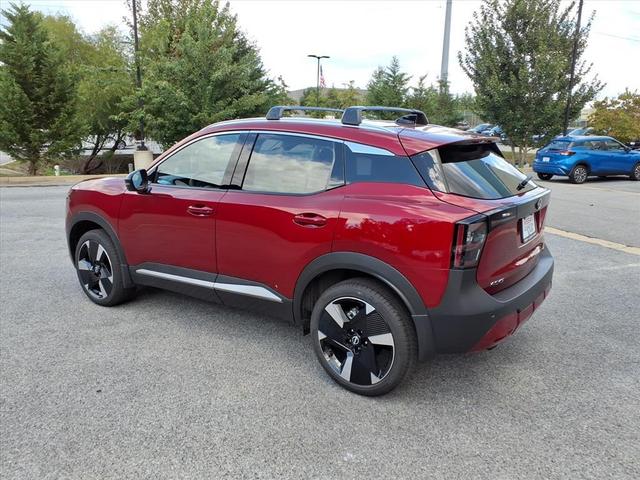 Photo of 2026 Scarlet Ember Tintcoat Nissan Kicks