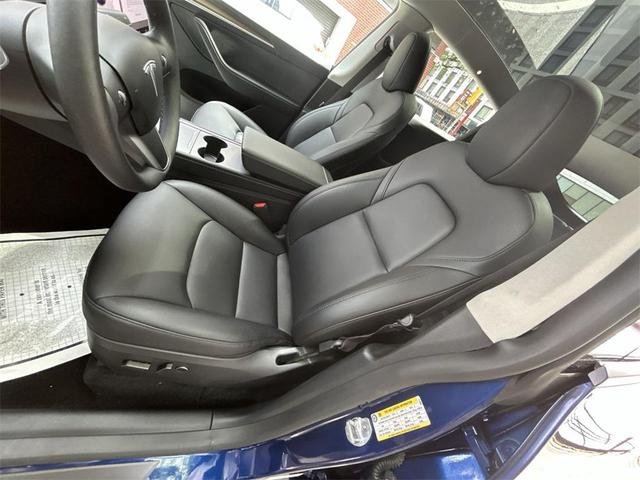 Photo of 2024 Deep Blue Metallic Tesla Model Y