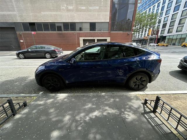 Photo of 2024 Deep Blue Metallic Tesla Model Y