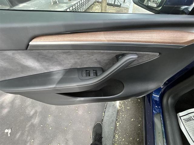 Photo of 2024 Deep Blue Metallic Tesla Model Y
