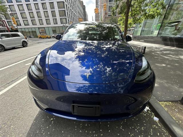 Photo of 2024 Deep Blue Metallic Tesla Model Y