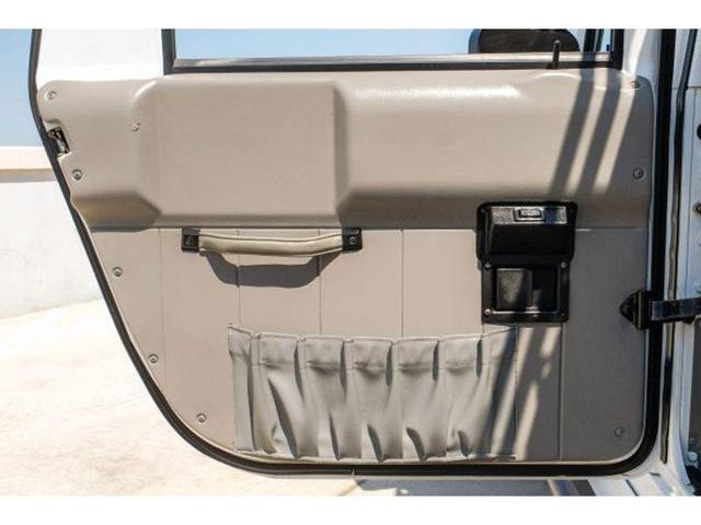 Photo of 2001 Bright White Am General Hummer