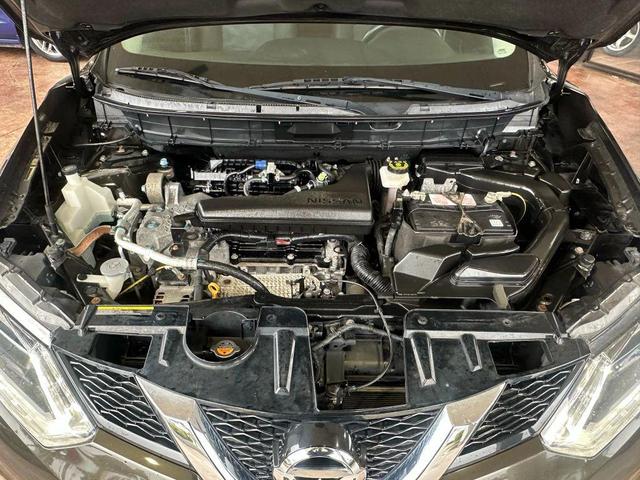 Photo of 2016 Midnight Jade Nissan Rogue