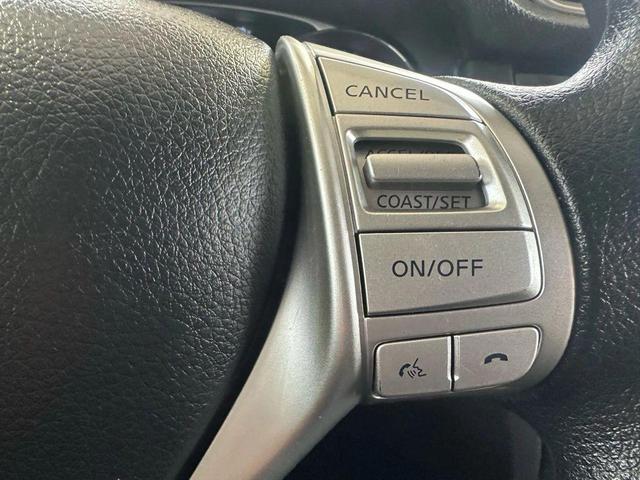 Photo of 2016 Midnight Jade Nissan Rogue