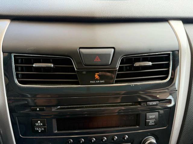 Photo of 2015 Cayenne Red Nissan Altima