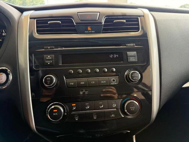 Photo of 2015 Cayenne Red Nissan Altima