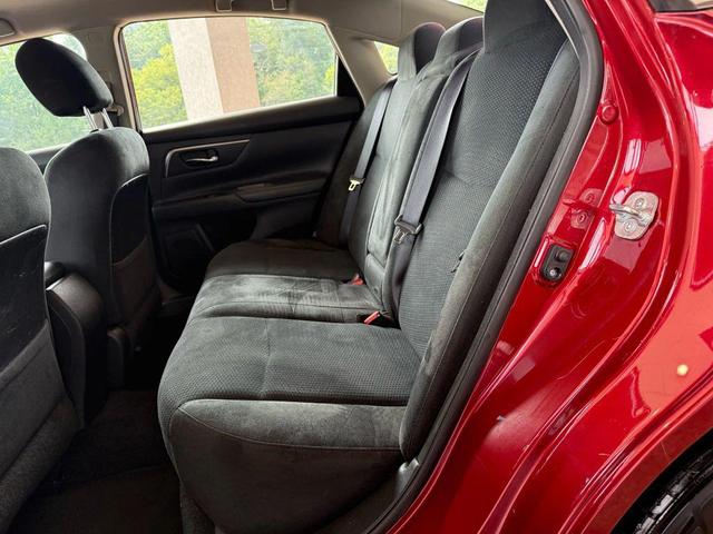 Photo of 2015 Cayenne Red Nissan Altima