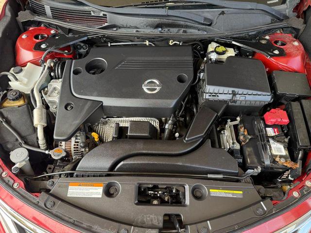Photo of 2015 Cayenne Red Nissan Altima