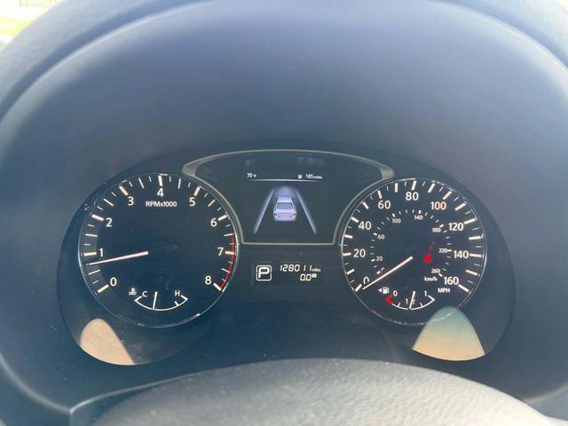 Photo of 2015 Cayenne Red Nissan Altima