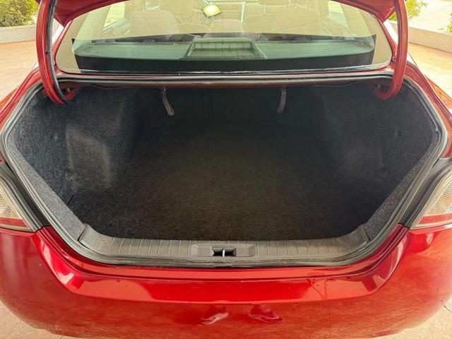 Photo of 2015 Cayenne Red Nissan Altima