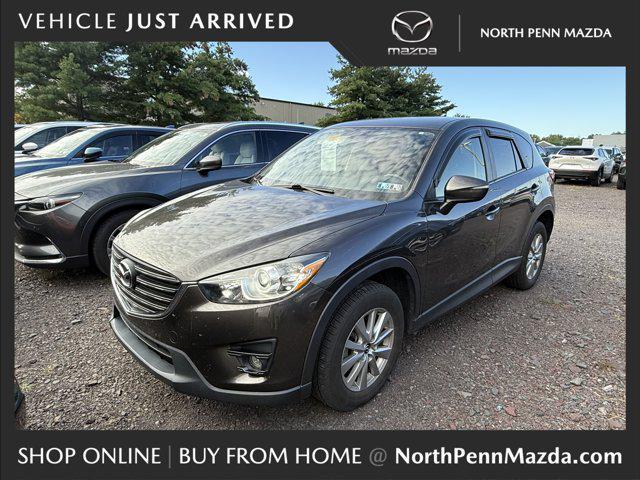 Photo of 2016 Titanium Flash Mica Mazda CX-5