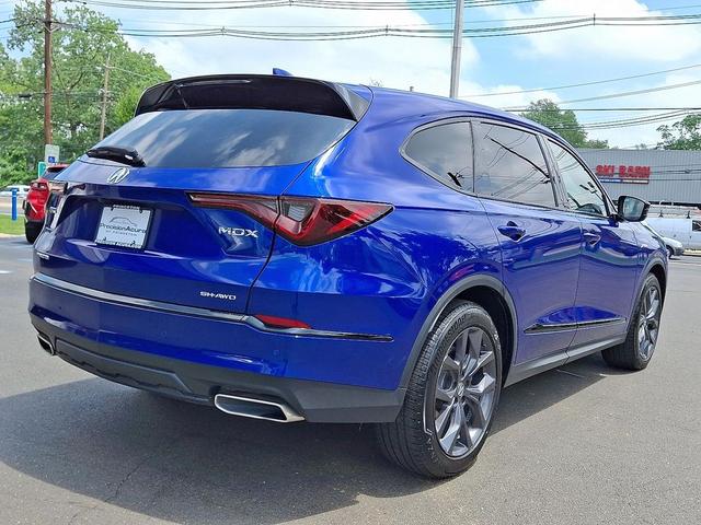 Photo of 2023 Apex Blue Pearl Acura MDX