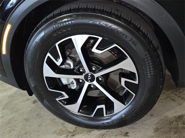 Photo of 2023 Ebony Black Kia Sportage