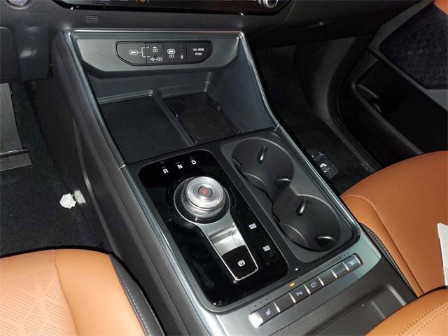 Photo of 2025 Aurora Black Pearl Kia Carnival Hybrid