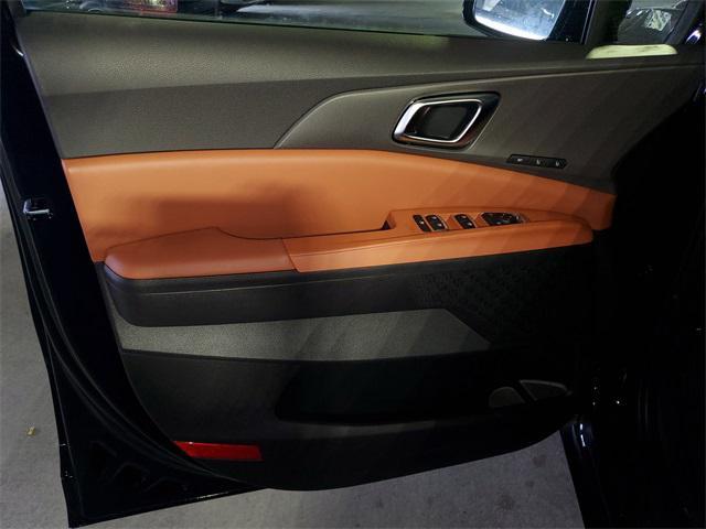 Photo of 2025 Aurora Black Pearl Kia Carnival Hybrid