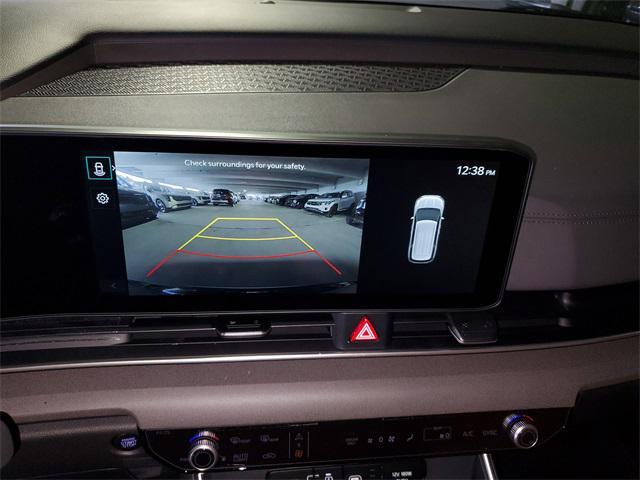 Photo of 2025 Aurora Black Pearl Kia Carnival Hybrid