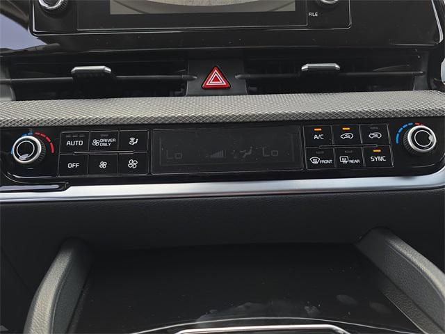 Photo of 2025 Steel Gray Kia Sportage Hybrid