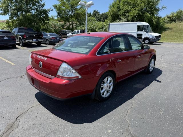 Photo of 2009 Sangria Red Clearcoat Metallic Mercury Sable