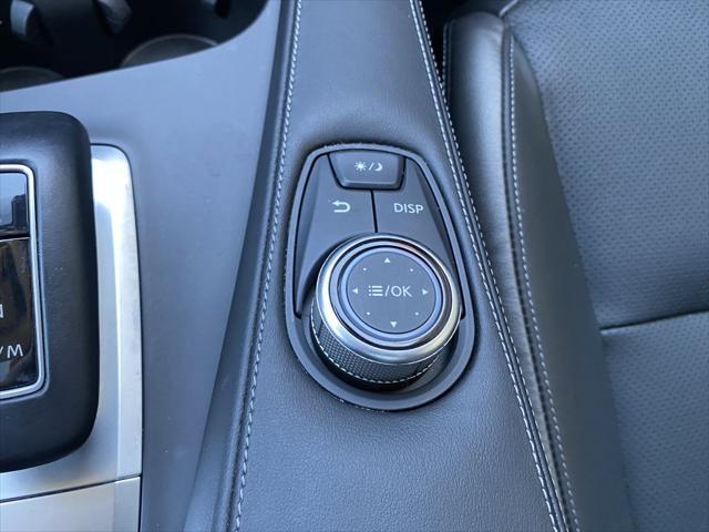 Photo of 2023 Radiant White INFINITI QX50