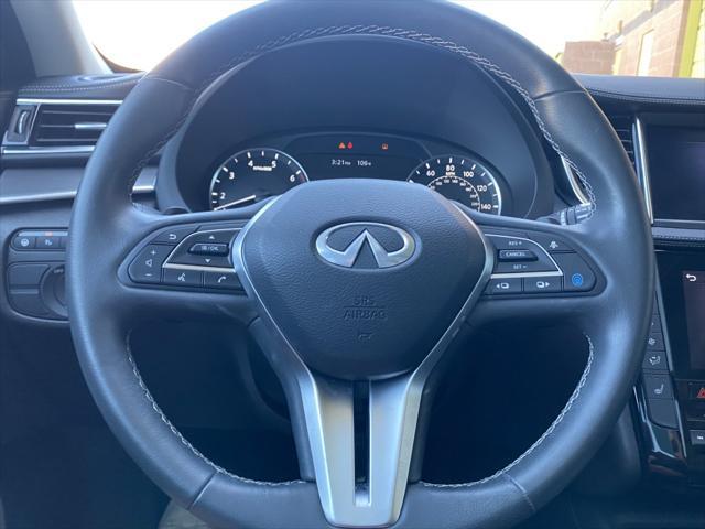 Photo of 2023 Radiant White INFINITI QX50