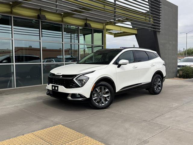 Photo of 2025 Snow White Pearl Kia Sportage Hybrid