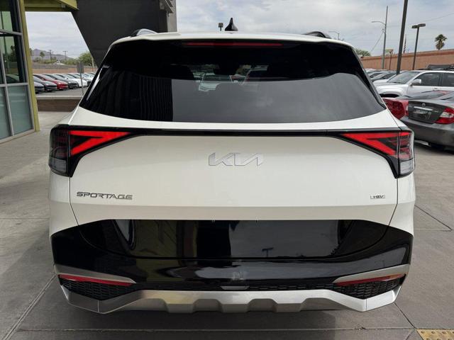 Photo of 2025 Snow White Pearl Kia Sportage Hybrid