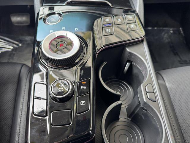 Photo of 2025 Snow White Pearl Kia Sportage Hybrid