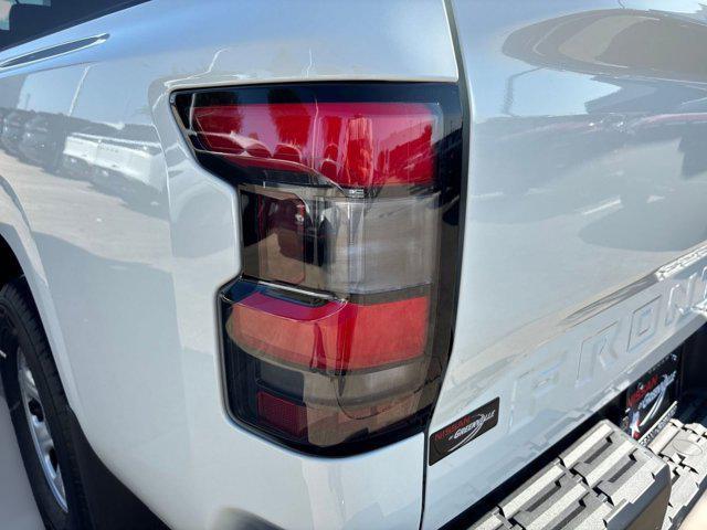 Photo of 2026 Glacier White Nissan Frontier