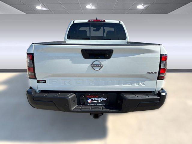Photo of 2026 Glacier White Nissan Frontier