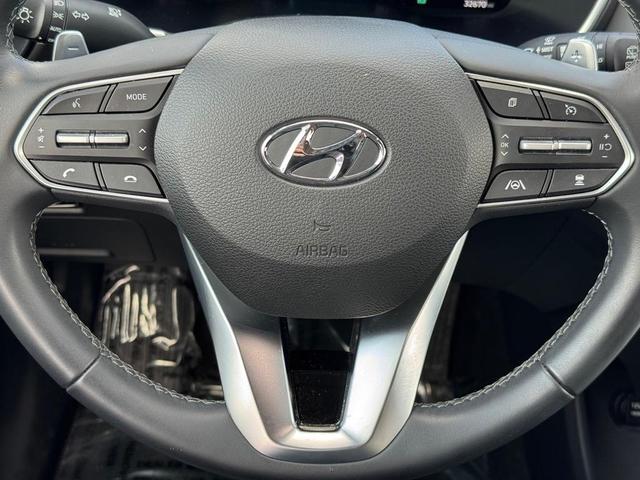 Photo of 2023 Calypso Red Hyundai SANTA FE HEV