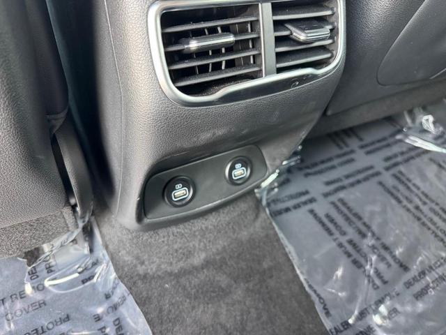 Photo of 2023 Calypso Red Hyundai SANTA FE HEV