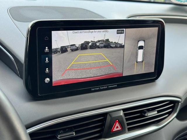 Photo of 2023 Calypso Red Hyundai SANTA FE HEV