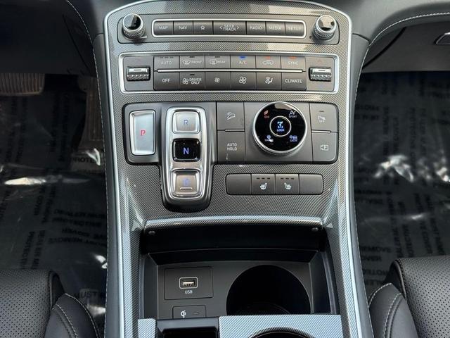 Photo of 2023 Calypso Red Hyundai SANTA FE HEV