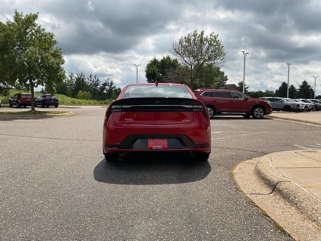 Photo of 2025 Supersonic Red Toyota Prius Plug-In Hybrid
