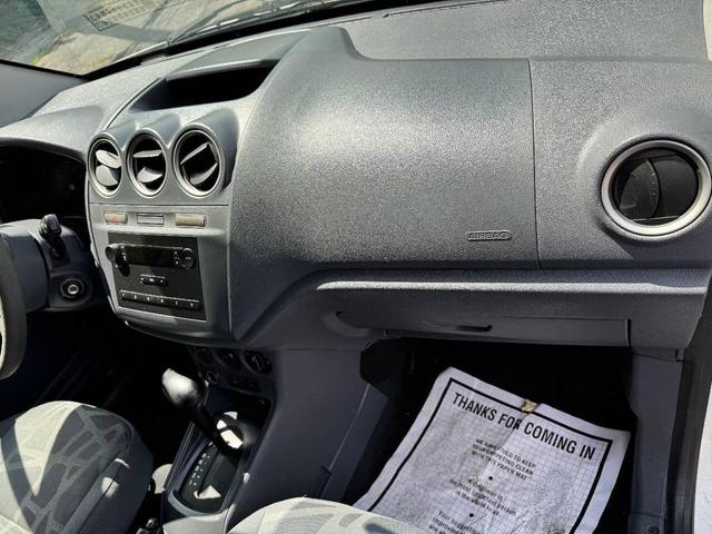 Photo of 2012 Frozen White Ford Transit Connect