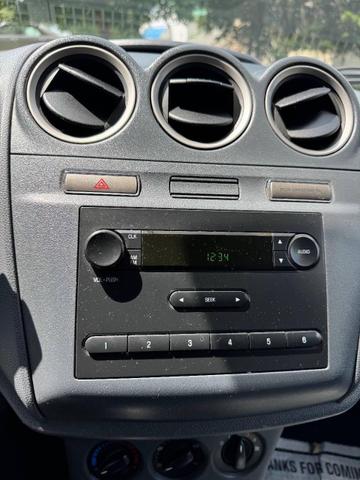 Photo of 2012 Frozen White Ford Transit Connect