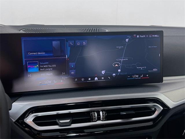 Photo of 2024 Black Sapphire Metallic BMW i4 Gran Coupe