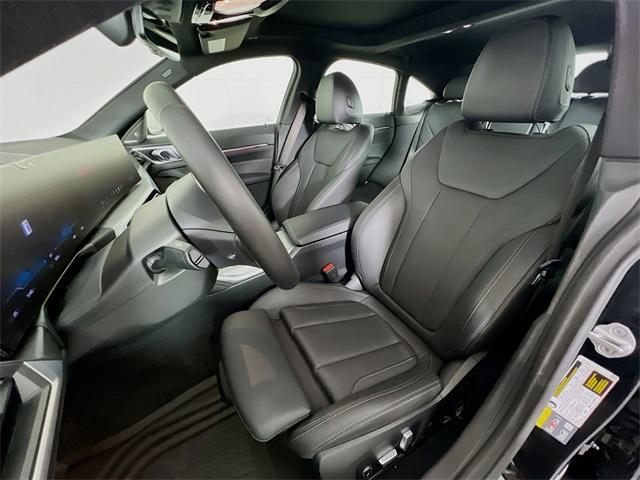 Photo of 2024 Black Sapphire Metallic BMW i4 Gran Coupe