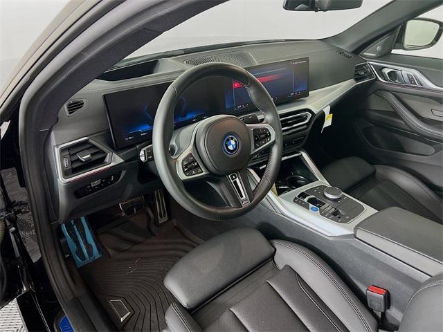 Photo of 2024 Black Sapphire Metallic BMW i4 Gran Coupe