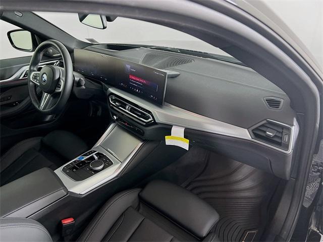 Photo of 2024 Black Sapphire Metallic BMW i4 Gran Coupe