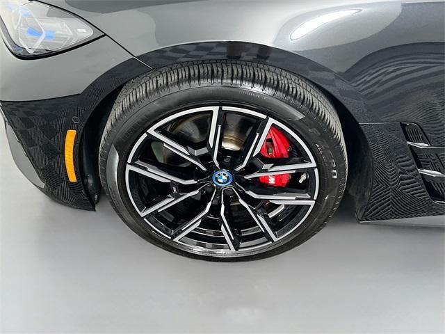 Photo of 2024 Black Sapphire Metallic BMW i4 Gran Coupe