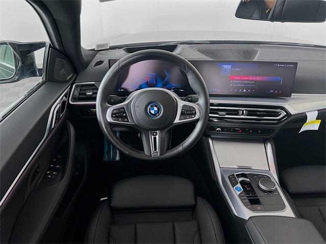 Photo of 2024 Black Sapphire Metallic BMW i4 Gran Coupe