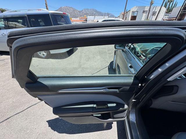 Photo of 2014 Sterling Gray Metallic Ford Fusion Hybrid