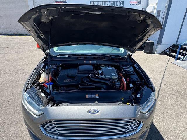 Photo of 2014 Sterling Gray Metallic Ford Fusion Hybrid